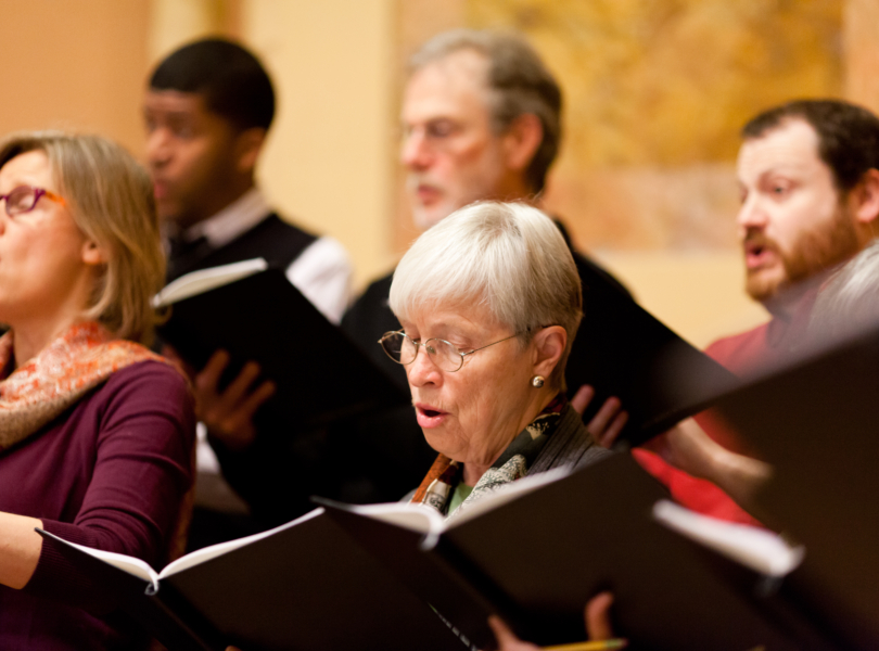 A mixed-voice choir sings during Sunday worship