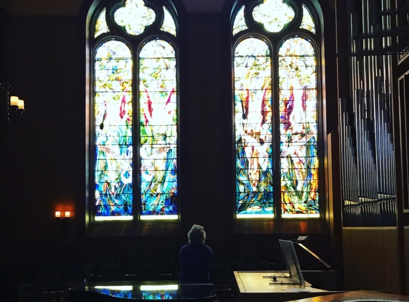 woman reflecting in a sanctuary