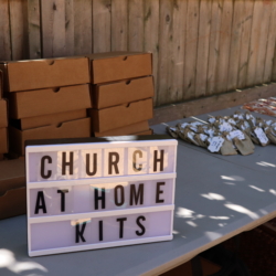 a sign saying "church at home kits"